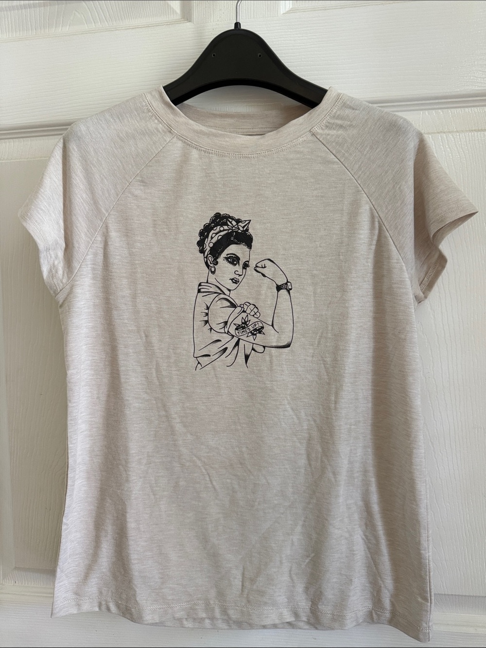 oiselle Light Beige Short Sleeve Tee with Black Rosie Graphic